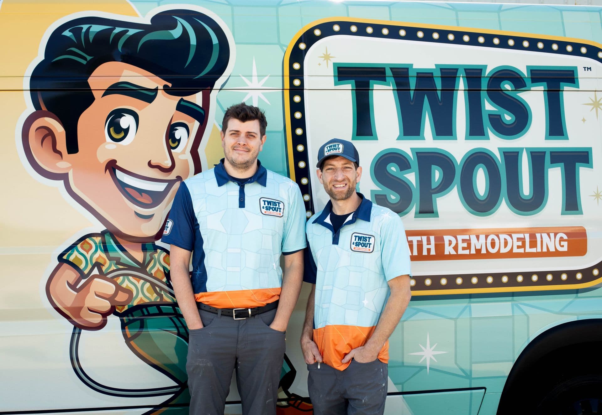 Twist & Spout Installers standing in front of branded work van